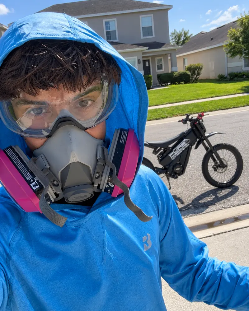 Angel Flores wearing protective equipment while working with Pure Pressure